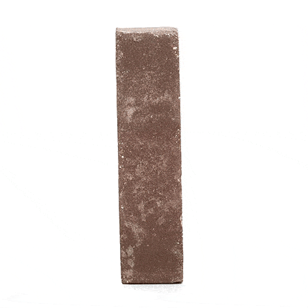 Single browny red Bergamo clay paver standing upright and revolving to show texture and tones. Free UK delivery available.