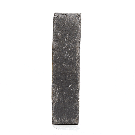 Single Lucca clay paver standing upright and revolving to show smooth and sanded faces. Free UK delivery available.