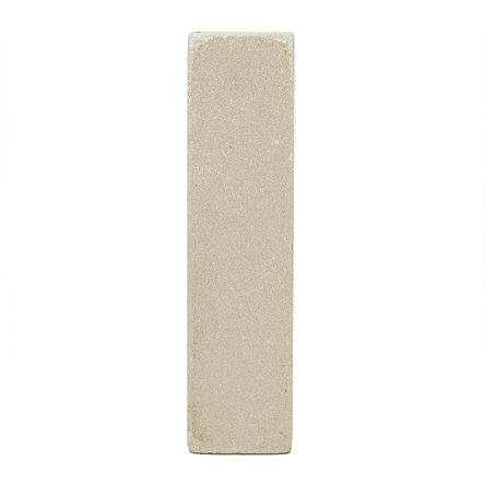 Single tumbled Beige sandstone patio brick standing upright and revolving. Free UK delivery available.