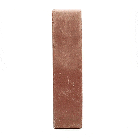 Single Roma clay paver standing upright and revolving to show colour and variation. Free UK delivery available.