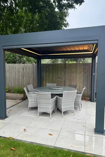 Deluxe Pergola with Somfy control system, offering remote management of louvres, blinds, heaters, and LED lights.