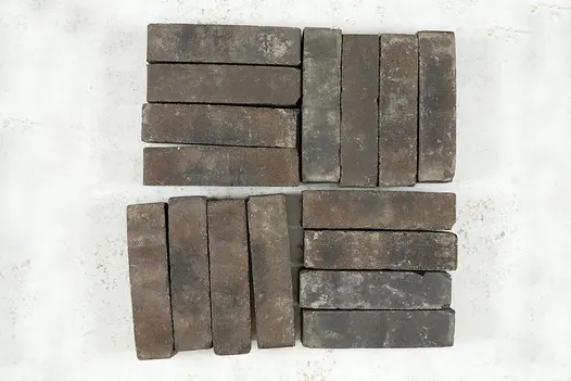 16 Ancona clay pavers from Kessel Garden collection laid in 4 blocks of 4 at right angles to each other within a square.
