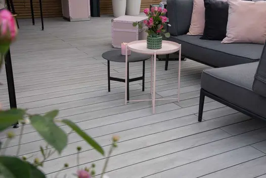 L-shaped sofa, 2 nested tables, pots and boxes sit on Luna Classic DesignBoard on Boodles trade stand, RHS Chelsea 2022.