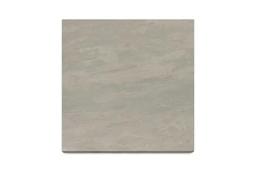 Swatch of Raj Green porcelain paving, used for 36mm bullnose steps, highlighting the colour variation and precise edges.