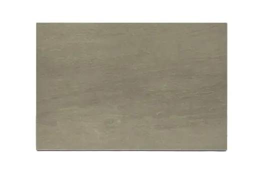 Close-up swatch of Raj Green porcelain paving, demonstrating the varied tones and smooth surface for 36mm bullnose steps.