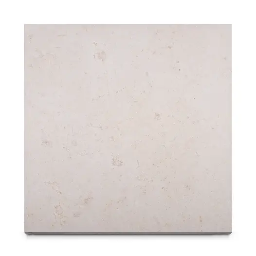 Single Jura Beige smooth sandstone slab seen from above, showing pale colour and markings. Free next-day UK delivery available.