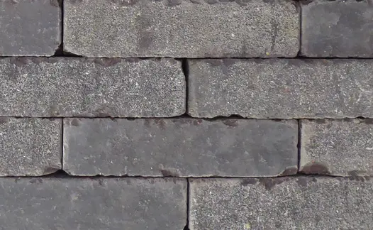 View from above of ten Amersham Clay Pavers in a row of three, showing off colour variation and texture.