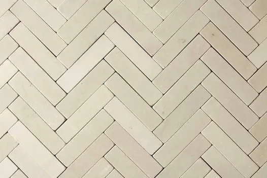 Detailed view of Beige Stone Pavers, showcasing the natural beauty and versatility of the stone pavers as they are applied as patio bricks.