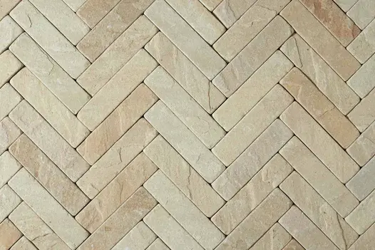 Detailed view of Tumbled Mint Sandstone Pavers, highlighting the smooth, tumbled finish of the stone pavers and their application as patio bricks.