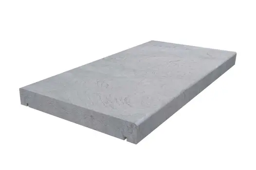 Heath smooth sandstone pencil round straight coping with drip line under each long side.