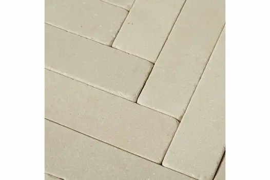 Close-up shot of Beige Sandstone Pavers, highlighting the smooth texture and warm tones of the stone pavers used as patio bricks.
